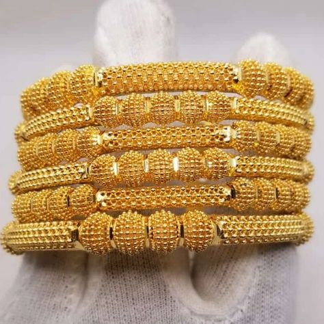 24k gold plated fancy casting bangle's sets New design collection artificial jewelry . Wholesaler of Unique Artificial Jewelry. . 24 karat gold plated fancy handmade artificial jewelry house 🏠 . Long lasting color Gold plated necklace and earrings with beautiful gift pack 24 karat gold polish Material: Gold Plated Attractive design Use with caution, avoid chemicals etc. Bridal love to use these styles. High quality polish that makes its beauty appealing. No one can judge like gold Created a ... Artificial Jewelry, Gold Bangles For Women, Gold Plated Bangles, Gold Aesthetic, Gold Bangles Design, Gift Pack, Bangle Designs, Bangle Set, Gold Polish