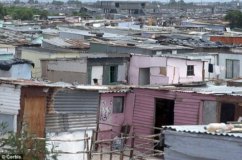 ±1.2 million people live in South African township Khayelitsha. Khayelitsha was established in 1983 under the principles of racial segregation and it is 1 of the biggest black townships in South Africa.   The majority of people live in informal settlements and ±65% are unemployed. Most residents survive by selling different products on the streets. Volunteers are doing maintenance work on 6 orphanages in Khayelitsha. Help them http://www.1procentclub.nl/projects/weeshuizenKhayelitsha/moredetail Informal Settlements South Africa, Shacks In South Africa, Squatter Camp, Shack House, Racial Segregation, Social Housing Architecture, Informal Settlement, Shanty Town, Africa Photography