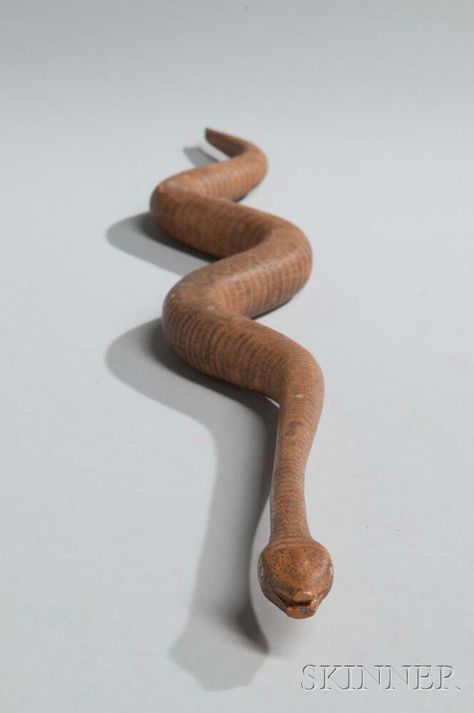 Great Lakes Carved Wood Snake. | Lot 178 | Auction 3005B | Sold for $1,230 Wood Snake, Snake Wood, Carved Wooden Animals, Native American Totem, Wood Carving For Beginners, Dremel Wood Carving, Dragon Decor, Wood Carving Designs, Wood Carving Patterns