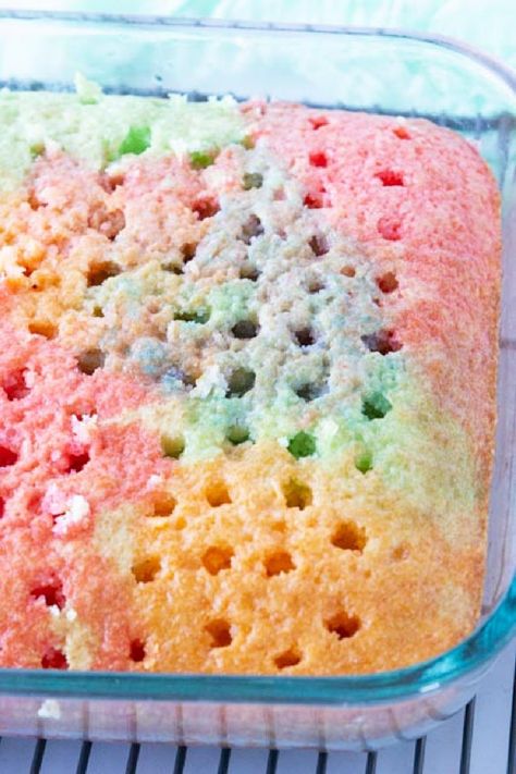 Jello Poke Cake Recipe, Jello Cake Recipes, Jello Poke Cake, Poke Cake Jello, Rainbow Cake Recipe, Homemade Cake Mixes, Rainbow Jello, Cool Whip Desserts, Rainbow Desserts