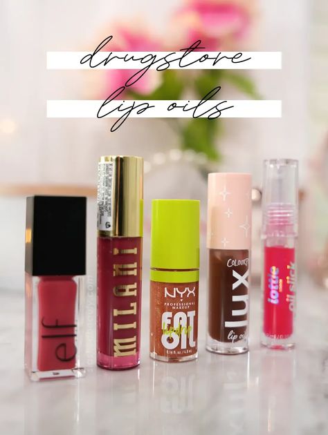 Let's compare and swatch the top 5 drugstore lip oils. With so many to choose from, read this review to see the difference between the most popular choices. | Slashed Beauty Best Lipgloss Drugstore Lip Gloss, Drugstore Lip Swatches, Affordable Lip Products, Best Plumping Lip Gloss Drugstore, Nyx Lip Lingerie Xxl Swatches, Drugstore Lips, Lip Oils, Pomegranate Oil, Calendula Oil