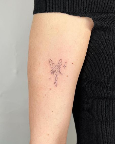 40 Best Fairy Tattoo Ideas You Should Check Fairy Wrist Tattoo, Pixie Hollow Tattoo, Winx Club Tattoo Ideas, Fairy Tattoo Placement Ideas, Fairy Tattoo On Wrist, Dainty Fairy Tattoos For Women, Dainty Fairy Tattoo Outline, Small Fairy Tattoos, Acne Mask