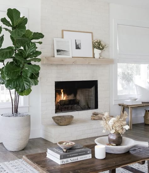 30 Gorgeous White Brick Fireplace Ideas To Update Your Home White Brick Fireplace, Mantel Design, Apartment Decoration, White Fireplace, Rug Guide, White Brick, Brick Fireplace, Fireplace Design, Fireplace Decor