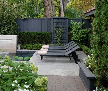 I love this dark grey stain on the back fence, it makes a nice backdrop for your landscaping! Fence Inspiration, Black Garden Fence, Grey Fences, Ideas Terraza, Black Fence, Gate Ideas, Backyard House, Black Garden, Backyard Paradise