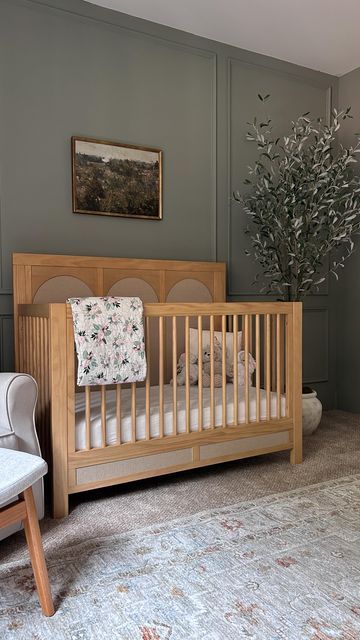 Melissa Coryell on Instagram: "Golden hour this morning with my girl ☀️ Comment SHOP to get a link sent to your DMs with all the details for our nursery - Follow @interiors.bymel for more neutral, classic, modern home design inspo - You can also shop my home using the LTK app 📱 #nursery #nurseryinspo #nurseryinspiration #namesake #ａｅｓｔｈｅｔｉｃ #babycrib #babygirl #wayfair #target #targetstyle #studiomcgee A68" Oak Crib Nursery Ideas, Namesake Nursery, Nursery With Natural Wood Crib, Sage White Wood Nursery, Nursery With Babyletto Crib, Studio Mcgee Nursery, Neutral Nursery Wood Crib, Baby Boy Nursery Room Ideas, Babyletto Washed Natural Crib