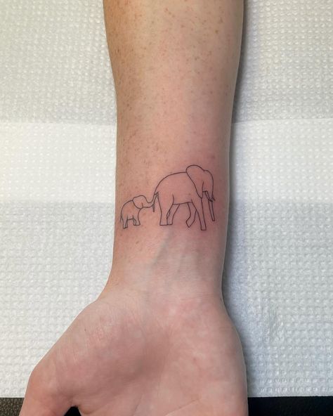 Mom and baby elephant fineline tattoo on the wrist for @stokkies_2024 Mama And Baby Elephant Tattoo, Baby Elephant Tattoo, Tattoo On The Wrist, Mama Tattoo, Mom And Baby Elephant, Fineline Tattoo, Elephant Tattoo, Elephant Tattoos, Mama Elephant