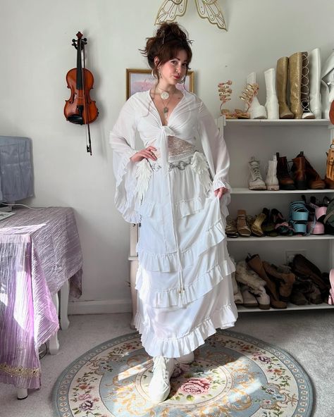 Channeling enchanting vibes in this boho witchy ethereal outfit, where magic meets… https://karmanepalcrafts.com/products/flowy-tiered-skirt-set-with-ruffle-sleeve-wrap-top #BohoWitch #EtherealStyle #fairycore Bell Sleeve Outfit, Tiered Long Skirt, Flowy Outfits, Fairy Core Outfits, Retro Style Outfits, Witchy Outfits, Long Tiered Skirt, Ruffle Sleeve Top, Outfit 90s