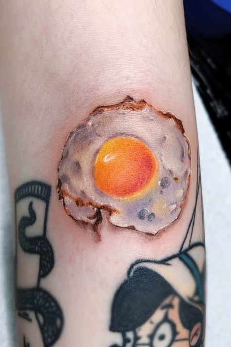 Orphic Egg Tattoo, Stack Of Pancakes Tattoo, Deviled Egg Tattoo, Breakfast Tattoo, Fried Egg Tattoo, Foodie Tattoo, Bacon And Egg Tattoo, Egg Tattoo, Om Tattoo Design