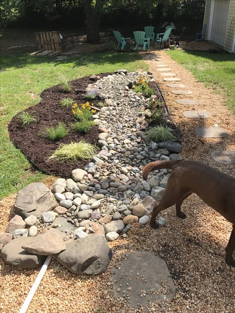 Dry creek bed with landscaping to fix drainage from sump pump issue Rock Drainage, Sump Pump Drainage, Dry Riverbed Landscaping, French Drains, Landscape Drainage, Backyard Drainage, Yard Drainage, Dry Creek Bed, Creek Bed