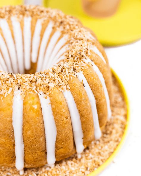 A boozy piña colada bundt cake filled with crushed pineapple and shredded coconut, topped with sweet and thick rum glaze. Pina Colada Bundt Cake, Pineapple Pound Cake, Pina Colada Rum, Summer Fruit Recipes, Pineapple Cake, Bundt Cakes Recipes, Bundt Cakes, Crushed Pineapple, Summer Kitchen