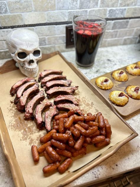 Skeleton made from BBQ ribs and little smokies Bbq Halloween Food, Halloween Ribs, Movie Themed Food Ideas, Skeleton Food, Halloween Bbq, Movie Themed Food, Scary Birthday, Halloween Autumn Aesthetic, Halloween Bday Party