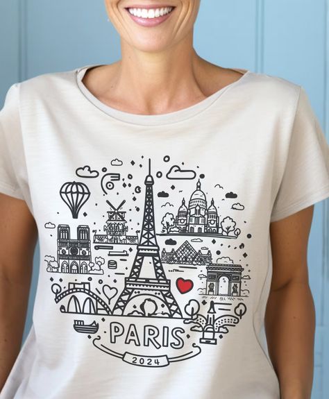 Love Paris, France Vacation, Paris Attraction Shirt, Trip to Europe, Paris 2024 Shirt, City doodles outfit. #tshirt #paris2024 #france #vacation #triptoeurope #surprise #present #birthday #gift #shirth #tee Disneyland Paris Shirt Ideas, I Love Paris Tshirt Aesthetic, Paris Women Shirt, Paris T Shirt Design, Surprise Present, France Vacation, Paris Tee, Trip To Europe, Love Paris