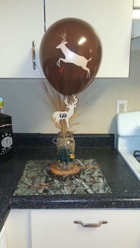 Hunting 50th Birthday Party, Hunting Party Centerpieces, Camo Graduation Party Ideas, Hunting Theme Table Decorations, Camo Centerpiece Ideas, Hunting Centerpieces, Hunting Theme Party For Men, Hunting Birthday Party Favors, Hunting Centerpiece Ideas