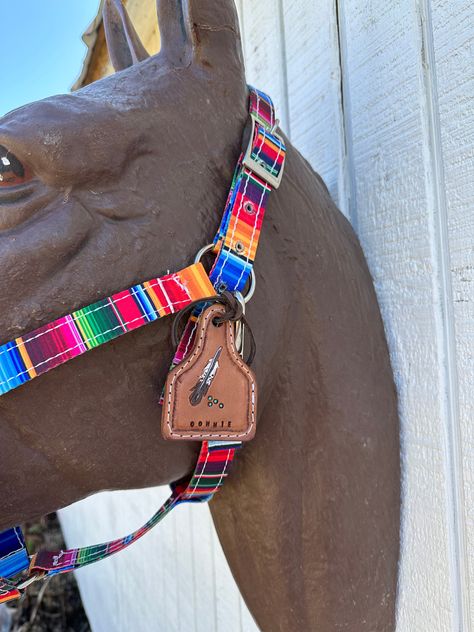 This is a braided horse halter made out of Paracord. It is one continuous braid and fits like a rope halter. Leather Name Tag, Custom Halters Horses, Custom Bronc Halter, Beaded Halters For Horses, Rope Halters For Horses, Leather Halters For Horses, Custom Horse Halter, Western Items, Barrel Racing Tack Rodeo