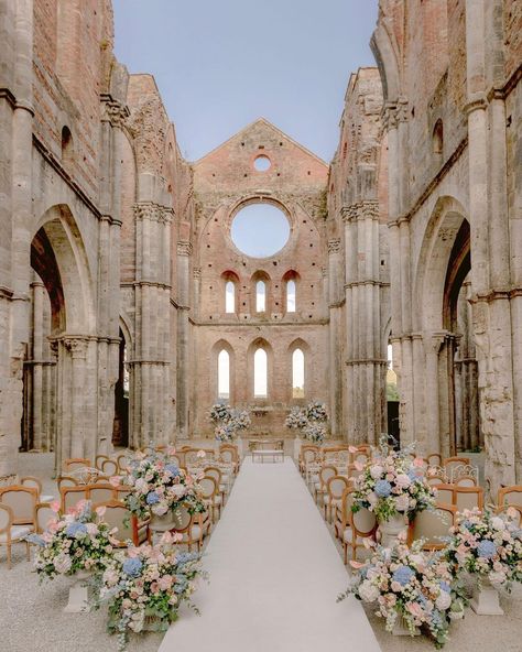 Flowersliving 🌸 on Instagram: “Her MAJESTY San Galgano Abbey beautifully adorned with elegant dusty blue and pink flowers 🌸 . .. … …. ….. Ph @facibenifotografia…” Dream Wedding Venues, Wedding Aisle Decorations, Future Wedding Plans, Wedding Planning Checklist, Tuscany Wedding, Wedding Checklist, Wedding Aisle, Wedding Mood, Italian Wedding