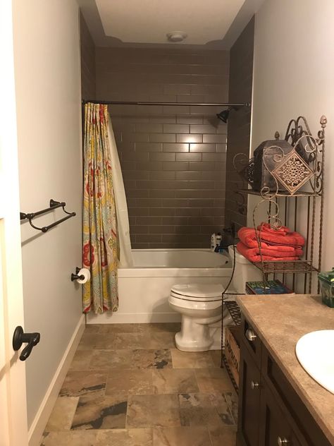 This simple trick will make your bathroom feel much bigger! from Thrifty Decor Chick Shower Curtain Hung High, Where To Hang Shower Curtain Rod, 10 Foot Shower Curtain, Shower Curtain Hung From Ceiling, High Ceiling Shower Curtain, Shower Curtain Ceiling To Floor, High Curtain Bathroom, How High To Hang Shower Curtain Rod, Shower Curtains From Ceiling To Floor