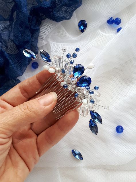 This Wedding hair comb with crystals,made of dark blue glass crystals. On the wedding day, every bride wants to look fantastic. This delicate comb blue crystals will be a magical addition to your look on your happiest day.  This will emphasize the ease of your image.  The comb is very conveniently attached to the hair and fits in with any hairstyle.  -Material- glass crystals  -Colors- silver and blue - Size - 4*2 inches (10 *5,5cm) - The wire may get dark - Unique handmade.  You deserve the bes Blue Headpiece, Bridal Hair Pieces Flower, Blue Bridal Earrings, Crystal Wedding Tiaras, Blue Hair Accessories, Rhinestone Hair Comb, Crystal Hair Comb, Bride Hair Accessories, Blue Bridal