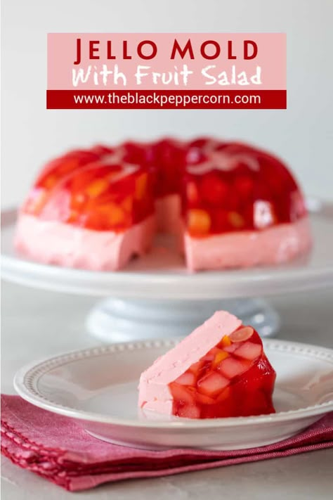 Jello Mold with Fruit Salad Recipe - The Black Peppercorn - This classic retro recipe is perfect for pot lucks, holidays, parties and more! A simple recipe with Strawberry jello, fruit salad from a can and cool whip. Jello Recipes With Cool Whip, Jello Fruit Salad, Jello With Cool Whip, Jello Fruit, Jello Fruit Salads, Jelly Salad, Jello With Fruit, Recipes With Cool Whip, Jello Mold Recipes