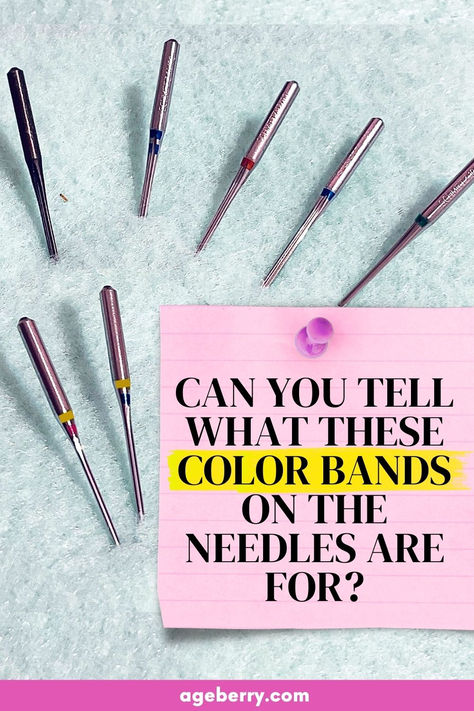 Close-up of Schmetz sewing machine needles arranged on a textured background, each with visible color bands indicating their type. A pink notepad with bold text asks, "Can you tell what these color bands on the needles are for?" Perfect for understanding needle types and color codes. Machine Embroidery Needles Guide, Types Of Quilting Techniques, Sewing Machine Needle Storage, Sewing Machine Needle Guide, Sewing Needle Sizes, Sew Ideas, Sewing Guide, Machine Needles, Sewing Machine Needle