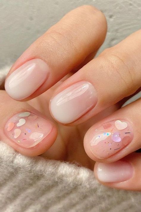 Looking for the best white nail designs that are perfect for an everyday look? Here are the trendiest white nail designs that will transform your beauty look effortlessly. Korean Nail Simple, Ombre Nails With Heart, White Ombre Nails, Elegant Manicure, Nail Water Decals, Confetti Nails, Korean Nail Art, Minimalist Nail Art, Heart Confetti