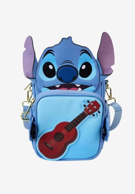 Experiment 626 is the perfect companion to take to your favorite theme park, Disneyland. Featuring a print of Stitch. Arms are flexible to open and close to hold front pouch.Front pouch includes two different prints - guitar on one side and frog on the other.One main lined zippered compartment.Measures approximately 8.75”W x 6.25”H x 2.25”D.Crossbody Purse features official Loungefly x Disney badge on back.Officially Licensed Loungefly x Disney merchandise. Disney Merchandise, Disney Stitch, Stitch Disney, Crossbody Purse, Purses Crossbody, Guitar, Pouch, Purse, Camping