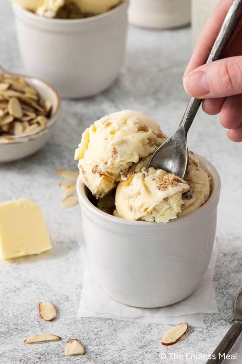 This butter almond ice cream recipe is rich, buttery, creamy, and sweet. It's made from a simple egg yolk custard for creaminess and finished with the addition of butter-sauteed almond slices for a little crunch. It's luscious, versatile, and easy to whip up in the comfort of your home! #theendlessmeal #icecream #almonds #almondicecream #dessert #summer Almond Ice Cream Recipe, Egg Yolk Custard, Unique Ice Cream Flavors, Butterscotch Ice Cream, Beer Ice Cream, Homemade Almond Butter, Strawberry Ice Cream Recipe, Almond Ice Cream, Dessert Summer