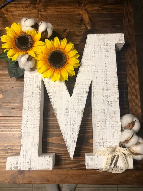 Personalize your home decor with this custom-made whitewash wooden letter M, with sunflowers and cotton stems. Ready to ship right now! Letter measures : [This item can also be customized with any letter of your choice!] Big Letter Decor, Decorated Letters For Wall, Wooden Letter Decoration Ideas, Sunflower Letters, Letter Decoration Ideas, Wooden Letters Decorated, Cardboard Letters, Letter Crafts, Letter Decor