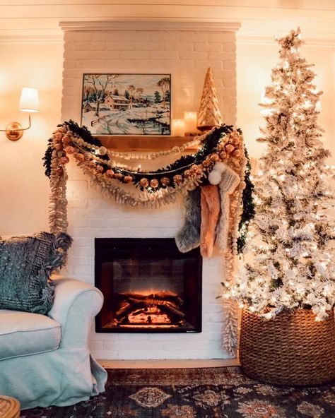 Having a fireplace is a real treat this time of year. This is our third year having a fireplace in this home. When we added this electric fireplace I had visions of swooping garland and stockings hung from the mantle. Vision came true this year. I brought out all my Christmas garland from past years and ended up layering it all here! Narrow Christmas Tree, Nesting With Grace, Christmas Mantle, Christmas Time Is Here, Christmas Inspo, Christmas Fireplace, Wallpaper Iphone Christmas, Boho Christmas, Christmas Mantels