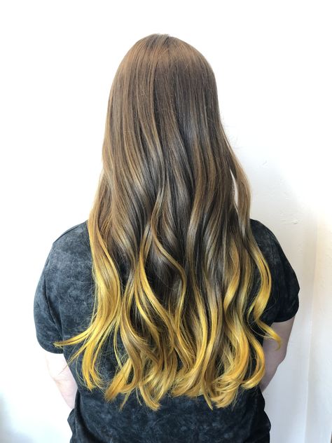 Brown hair with vivid yellow balayage tips Brown Hair With Yellow Highlights, Yellow Highlights In Brown Hair, Black Hair Yellow Highlights, Yellow And Black Hair Color, Yellow And Brown Hair, Brown And Yellow Hair, Yellow Balayage, Brown To Yellow Ombre Hair, Brown Hair Tones