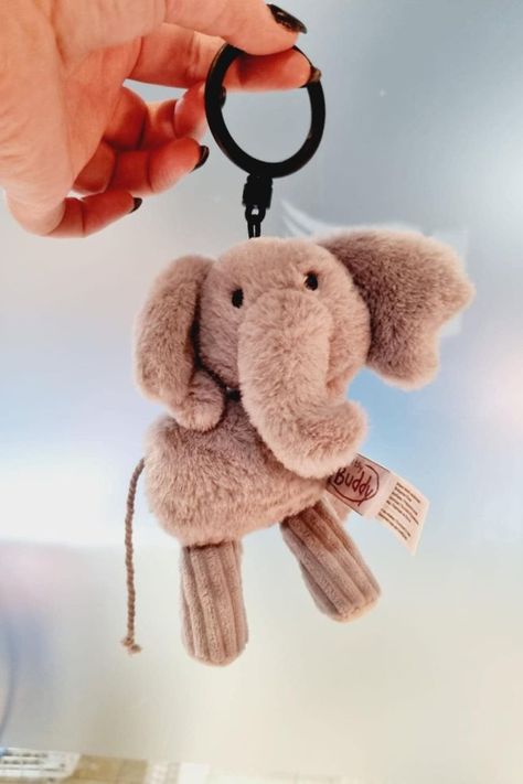 🧳🌟 He’s tons of fun and ready to roam! Meet Ezra the Elephant, your new adventure buddy. 🐘💖 From his big ears to his cute rope tail, you’ll love every bit of him. Filled with scented beads, these super-cute, on-the-go clips are perfect for decorating backpacks and more. Ezra the Elephant is scented in our delightful Berry Bright fragrance. 🌈✨ #EzraTheElephant #ScentsyBuddyClip #BerryBright #AdventureBuddy #BackpackDecor Scentsy Host, Scentsy Oils, Scentsy Buddy Clips, Scent Warmers, Scentsy Buddy, Scentsy Party, Scentsy Wax Bars, Big Ears, Black Raspberry Vanilla