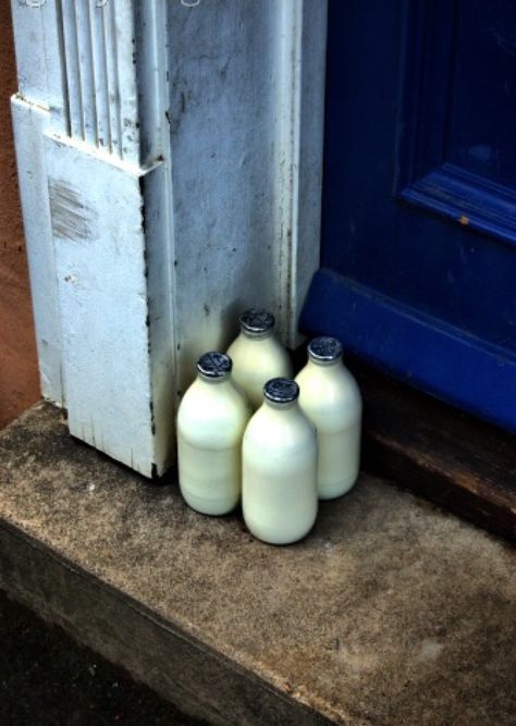 Four bottles of milk waiting on a doorstep in suburban London | Phil Ostroff Front Doorstep, Liquid Cheese, Old Milk Bottles, Lighting Mood, Milk Delivery, Milk Man, 1930s House, House Essentials, Mood Colors