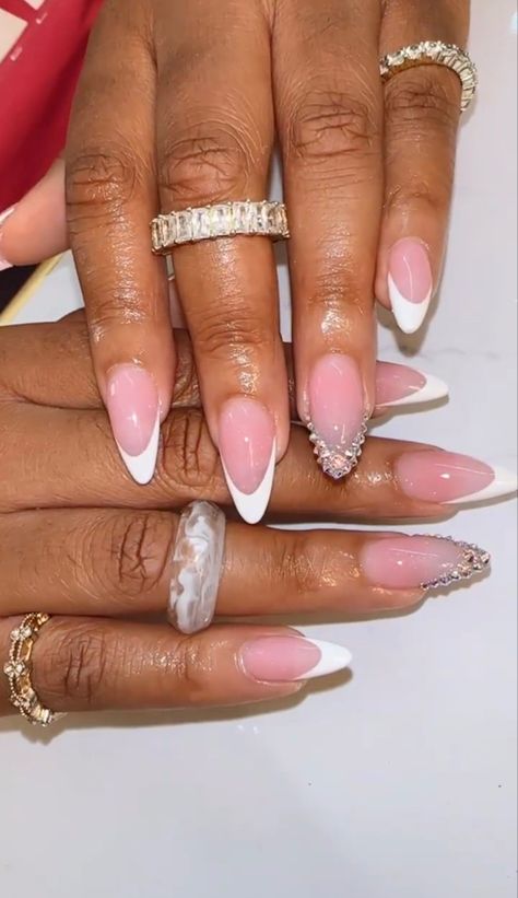 Oval French Tip Nails With Diamonds, Almond Nails French Tip With Gems, Black French Top With Gems, French Nails On Black Women, Almond Shape French Tip Design, Almond Shape Nails With Rhinestones, High Arch French Tip Nails, French Nail With Gems, French Tip Nails With Rhinestones Bling