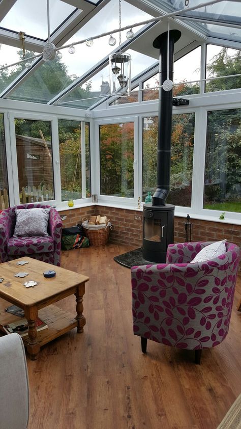 Wood Burning Stove In Conservatory, Greenhouse With Woodstove, Stove In Conservatory, Conservatory Log Burner, Wood Burner In Conservatory, Conservatory With Log Burner, 1970s House Renovation, Enclosed Patio Ideas, Glass Sunroom