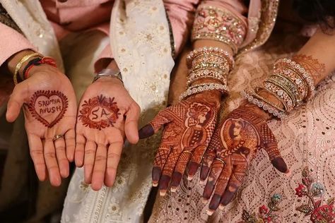 While brides are always coming up with unique and pretty henna designs, these boys mehndi design ideas are sure to take away your heart. The mehendi of the bride usually gets all the attention but these new age grooms with unique mehendi designs are stealing the show. We love how they flaunt their initials or their wedding hashtag via mehendi design and have all the attention. Scroll Down Below To Check Out These Boys Mehndi Design Ideas That We Truly Adore: 1. Boys Mehndi Design Ideas We Are Boys Mehndi Design, Pickle Picture, Roka Ceremony, Iskcon Temple, Short Mehndi Design, New Bridal Mehndi Designs, Mehndi Designs Bridal Hands, Delhi Wedding, Fusion Ink