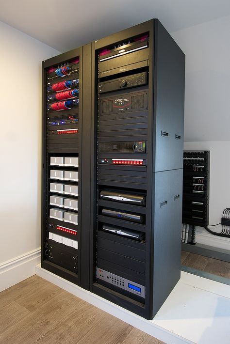 Luxury Integrated home in Cheshire. 

#luxury #interiordesing #cablemanagement #media #smart #modern #design #gadgets Home Server Rack, Media Rack, Data Room, Home Theater Room Design, Home Lab, Theater Room Design, Mechanical Room, Server Room, Custom Computer