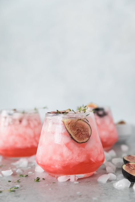 This Fig Thyme Shrub Cocktail is a perfect way to celebrate the late summer figs and the beginning of fall! It's the perfect mix of tangy and sweet, and the fresh thyme adds an unexpected, but delicious note of herby flavor. The shrub mixture keeps really well in the fridge for a couple weeks, so it's perfect for making cocktails whenever you want! I also love adding it to sparkling water with a little lime! #figs #shrub #cocktail Potato Arugula Salad, Salad With Fresh Herbs, Blackberry Wine, Beginning Of Fall, Sweet Cocktails, Pink Cocktails, Cocktails Recipes, Fall Cocktails, Pretty Drinks