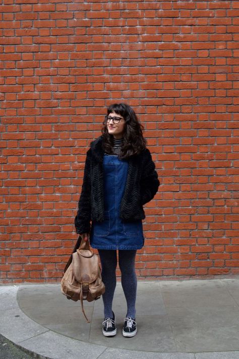 Call Me Katie - denim pinafore pull over dress with striped turtleneck, thick tights and flat shoes for a winter daytime look. Denim Dress And Tights Outfit, Jean Pinafore Dress Outfit, Jeans Pinafore Outfit, Denim Dress Black Tights, Denim Pinafore Dress Outfit Winter, Denim Dress Outfit Winter, Denim Pinafore Dress Winter, Pinny Dress, Denim Dress Outfit