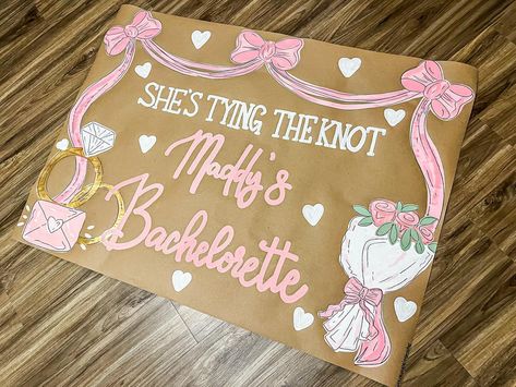 The cutest banner with sweet touches 🎀🤩💐 #banner #banners #bachelorette #rings #wedding #flowers #brownpaperbanner Wedding Shower Banner, Bachelorette Banner Painted, Frat Wedding, Bridal Shower Banners, Wedding Shower Banners, Painted Banners, Friendsgiving Dinner Party, Bachelorette Banner, Engagement Banner