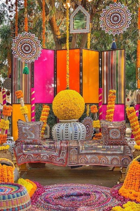 Colorful mehndi decor with marigold Mehndi Decoration Ideas At Home Mehendi, Mehendi Pictures, Mehndi Function Decoration, Mehndi Decor At Home, Mehndi Decoration Ideas At Home, Mehndi Setup, Trending Mehendi, Mehndi Decoration Ideas, Mehndi Decoration