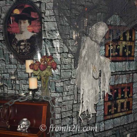 Transform your living room into a spooky haunted house by following these instructions on how to use Halloween Scene Setters. Mansion Basement, Diy Haunted Mansion, New Halloween Ideas, Halloween Scene Setters, Vampire Halloween Party, Halloween At Work, Halloween Garage, Haunted House Halloween Party, Halloween Haunted House Decorations