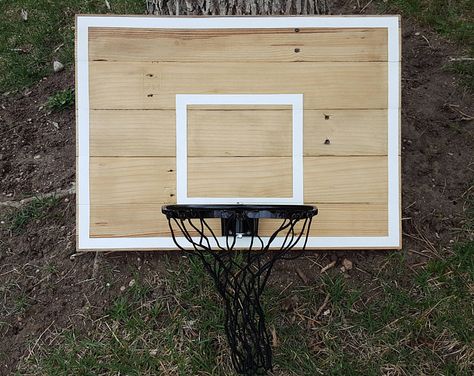 Pallet Wood Basketball Hoop With Painted Hoop Lines. Wall Mounted Pallet Wood Basketball Backboard and Rim. Diy Basketball, Indoor Basketball Hoop, Basketball Information, Basketball Rim, Basketball Tricks, Basketball Backboard, Indoor Basketball Court, Indoor Basketball, Basketball Goals