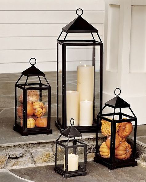 We love this idea - and you can get everything you need at our stores! Change out the pumpkins for something else as the seasons change! http://www.oldtimepottery.com/products/home_decor/candle-holders-wall-sconces Porche Halloween, Porch Lanterns, Outdoor Fall Decor Ideas, Fall Front Porch Ideas, Boho Outdoor, Budget Patio, Fall Deco, Fall Front Porch, Fall Outdoor Decor