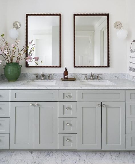 Refresh your bathroom with a gray shaker dual bath vanity topped with a honed gray marble countertop and brushed nickel faucets. Heidi Caillier Design, Beautiful Bathroom Cabinets, Shaker Bathroom, Shaker Bathroom Vanity, Bathroom Moodboard, Drømme Bad, Heidi Caillier, Bathroom Cottage, Brushed Nickel Bathroom