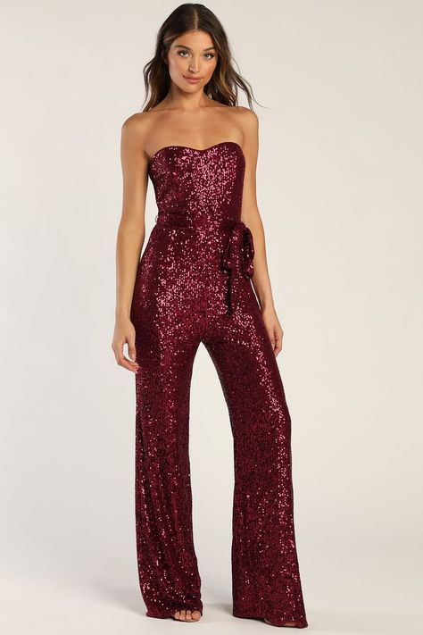 Catch some admiring glances when you hit the dancefloor in the Lulus Flirty Moves Wine Red Sequin Strapless Wide-Leg Jumpsuit! Dazzling wine red sequins dance across stretchy mesh as it shapes this party-ready jumpsuit that has a sweetheart neckline and a strapless, princess-seamed bodice (with hidden no-slip strips). A high waist, with a tying sash belt, tops wide-cut pant legs that fall to ankle-grazing hems. Hidden back zipper/clasp. Red Sequin Jumpsuit, Party Outfit Formal, Jumpsuit Sequin, Ruby Jubilee, Casual Formal Dresses, Sequin Jumpsuit, Lulu Fashion, Strapless Jumpsuit, Casual Wedding Dress