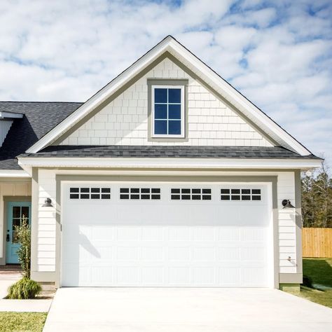 Simple Garage Door Maintenance Tips | The Family Handyman Garage Security, Garage Door Maintenance, Automatic Garage Door, Building A Workbench, Burglar Proof, Steel Garage Doors, Overhead Garage Door, Overhead Garage, Wood Garage Doors