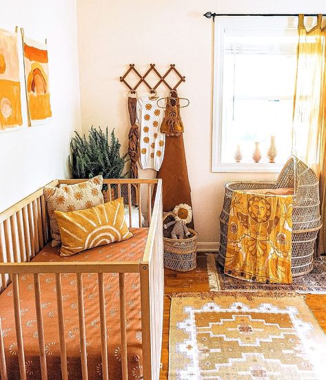 Sunny Themed Nursery, 70s Baby Nursery, Boho Cribs, 70s Nursery Theme, Nursery With Color, Boho Sunshine Nursery, Boho Gender Neutral Nursery, Nursery Ideas Neutral Boho, Baby Nursery Colorful