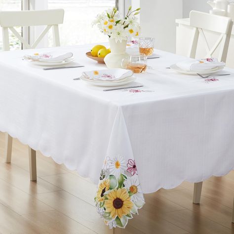 PRICES MAY VARY. Newbridge Yellow Sunflowers and Daisies Rectangle Embroidered Tablecloth, 52 x 70 Inch, Summer Cutwork Wrinkle Free, Stain Resistant Fabric Table Cover for Indoor Outdoor Dining and Parties SIZING: 52" x 70" Oblong / Rectangle (132 x 178cm) - Fits tables from 28 Inch x 46 Inch to 40 Inch x 54 Inch and Seats 4 to 6 People - Rectangle/Oblong Styling:The Newbridge Sunflowers and Daisies Embroidered Tablecloth features embroidered and printed flowers with open cutwork on a white tex White Table Cover, Indoor Outdoor Dining, Sunflowers And Daisies, Yellow Sunflowers, Vinyl Tablecloth, Fabric Table, Embroidered Tablecloth, Pretty Tables, Tablecloth Fabric