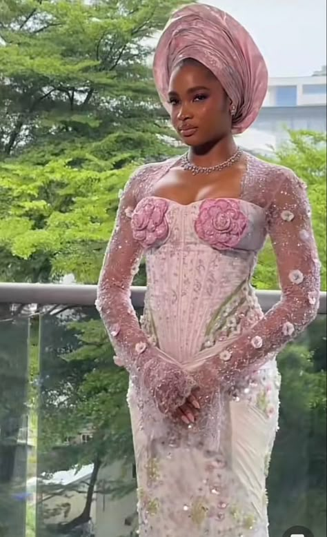 #nigerianbride #nigerianwedding #asooke #yorubawedding #yorubabride #engagementphotos #asoebi #yoruba #asookestyles #africanprintdresses #aesthetic #africanfashion #lacestyles #lacecorset #africanlacestyles #asoebicorset Asooke Styles For Brides, Pink And Blue Asoebi, Pink Asoebi Lace Styles, Blush Pink Asoebi Styles, Pink Nigerian Wedding Dress, Lace Wedding Dress Styles, Yoruba Wedding Dress, Pink Asoebi, Yoruba Traditional Wedding Attire Purple