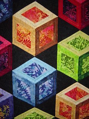 Elisa Lawrance chose brilliant Southwest batiks for this open tumbling block quilt Dimensional Quilts, Journal Quilts, Labyrinth Walk, Tumbling Blocks Quilt, Optical Illusion Quilts, Colchas Quilting, Patchwork Inspiration, Tumbling Blocks, 3d Quilts