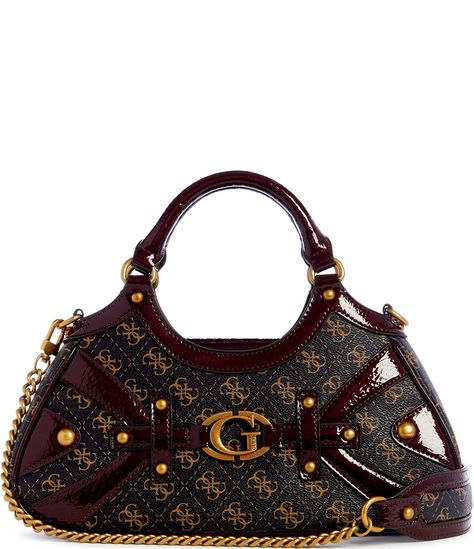 From Guess, the Mintha Brown Logo Satchel Bag features:Trim: Patent PU80% Polyester, 20% Cotton liningAntique bronze hardwareQ logo detailMag snap closureSingle compartmentInterior pockets: 1 zip, 6 credit card slotsExterior details: back zip pocket, feetTop handle: Approx. 4.75" handle dropAdjustable removable crossbody strap: Approx. 22" detach dropApprox. dimensions: 12.5" x 3&#0 Black Owned Designer Handbags, Classy Gifts For Women, Bags With Outfits, Vintage Luxury Bags, Weird Items, 2000s Purse, 2000s Bags, Brown Clothes, Vintage Designer Bags